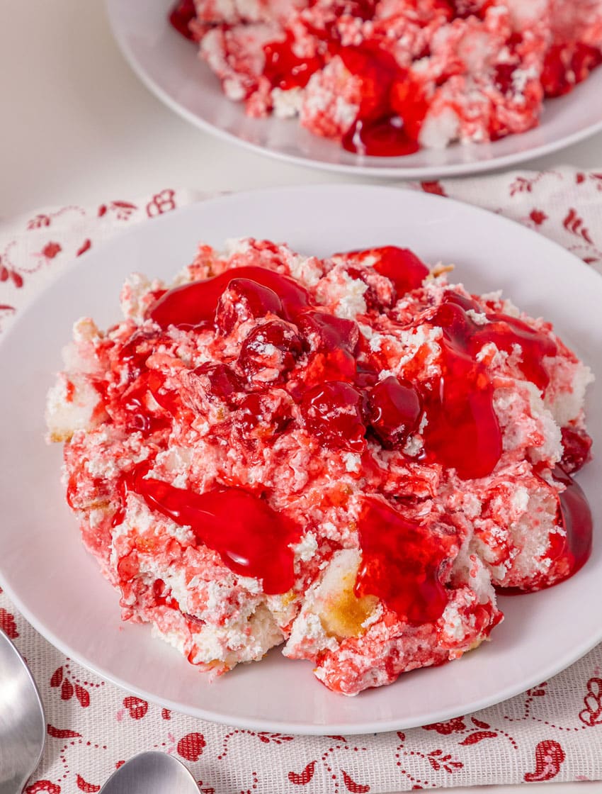 old fashioned cherries in the snow dessert in two shallow white bowls
