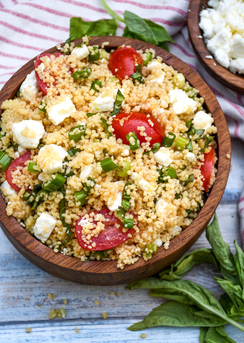easy everything summer couscous salad in a wooden bowl