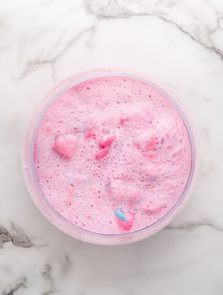 homemade unicorn punch in a large glass bowl