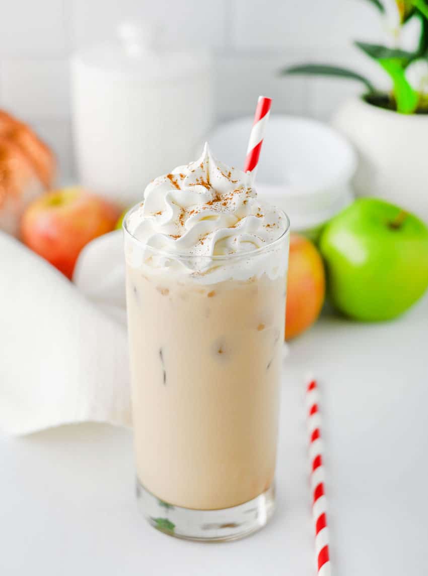 a copycat Starbucks iced caramel apple latte in a small glass jar