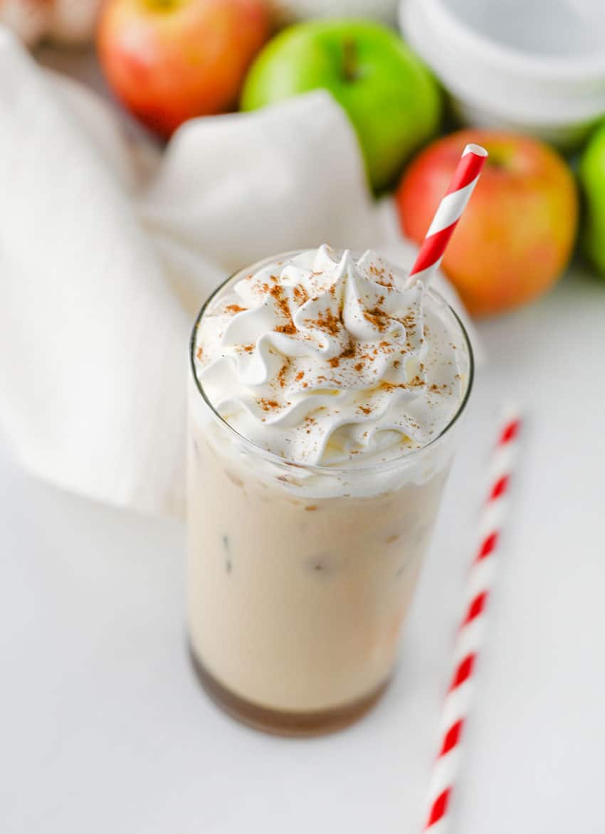 a copycat Starbucks iced caramel apple latte in a small glass jar