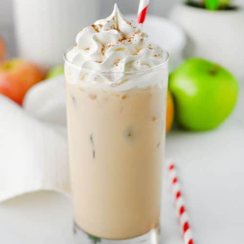 a copycat Starbucks iced caramel apple latte in a small glass jar