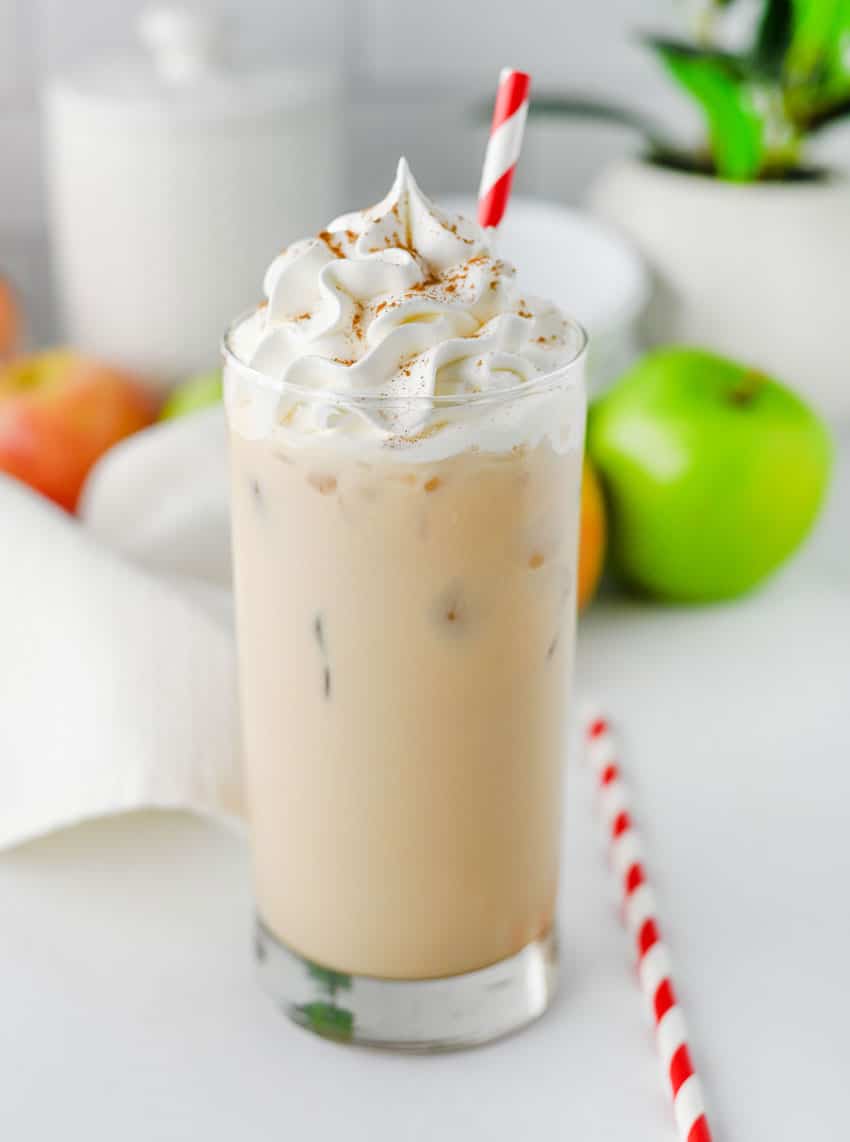 a copycat Starbucks iced caramel apple latte in a small glass jar