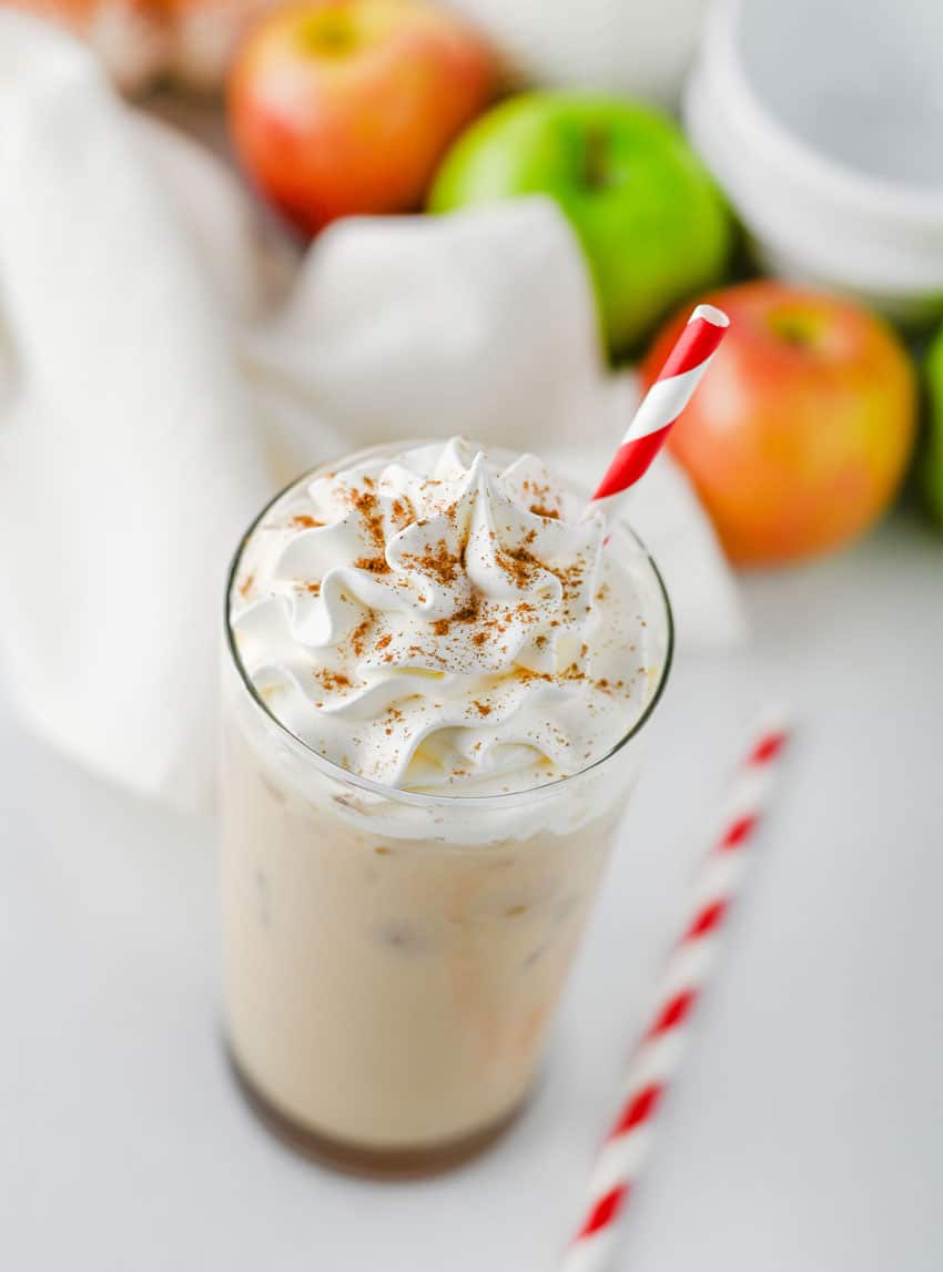 a copycat Starbucks iced caramel apple latte in a small glass jar