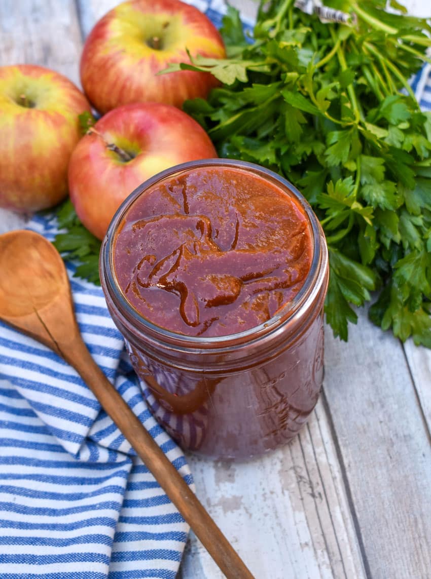 homemade apple butter barbecue sauce in a small glass jar