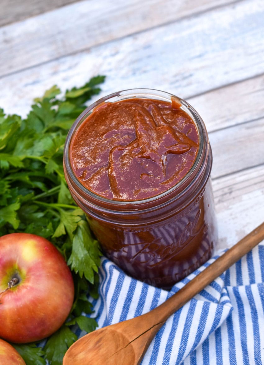 homemade apple butter barbecue sauce in a small glass jar