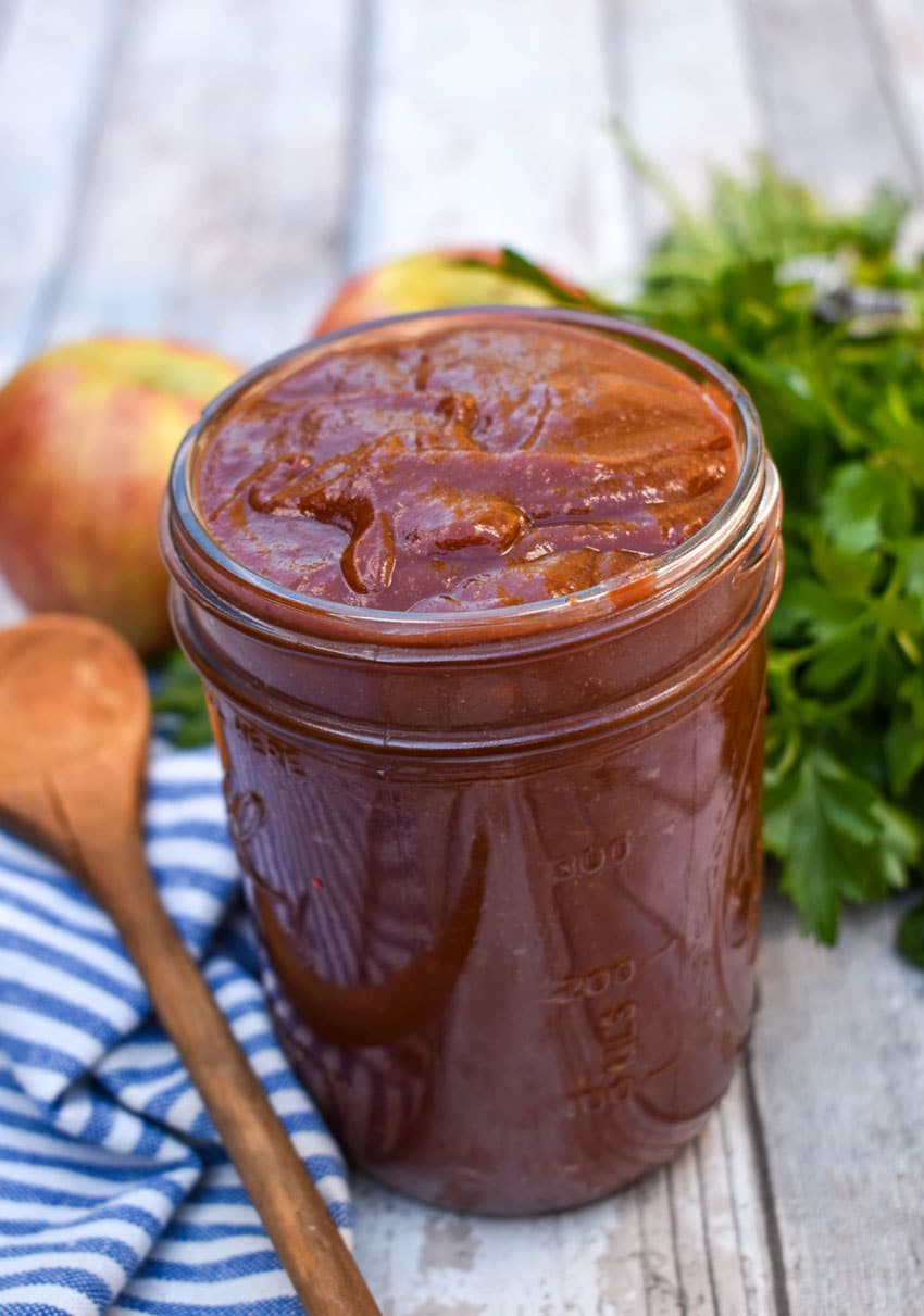homemade apple butter barbecue sauce in a small glass jar