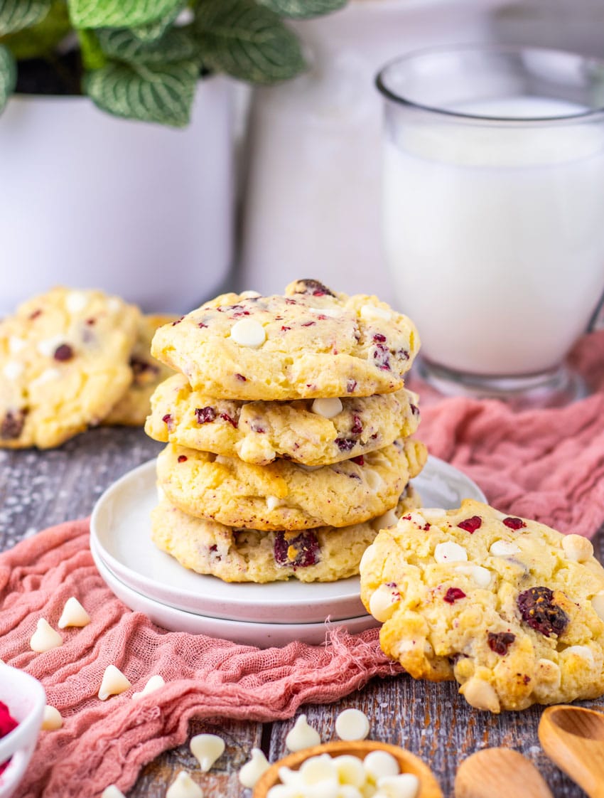 a stack of copycat Subway raspberry cheesecake cookies on a small white dessert plate