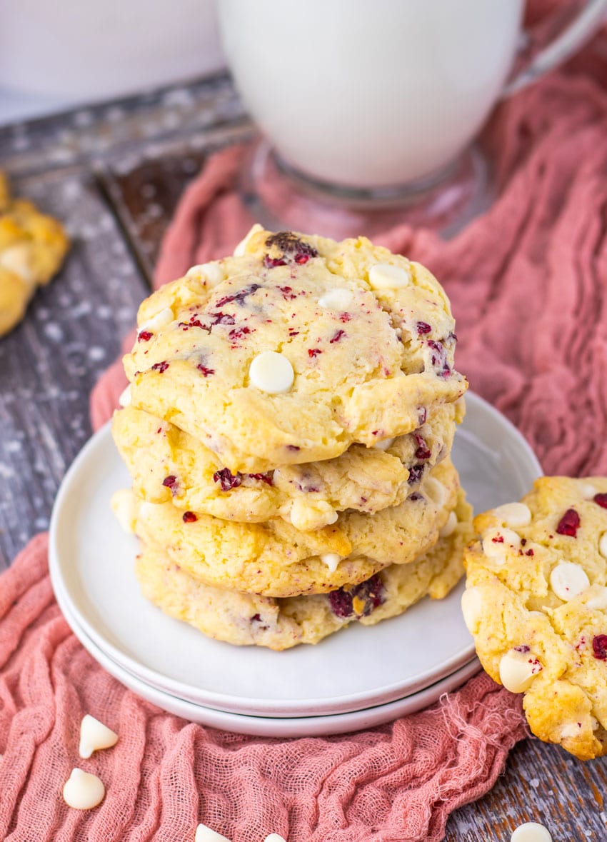 a stack of copycat Subway raspberry cheesecake cookies on a small white dessert plate