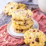 a stack of copycat Subway raspberry cheesecake cookies on a small white dessert plate