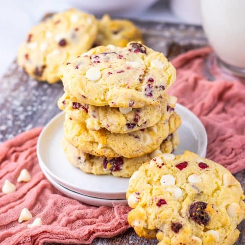 a stack of copycat Subway raspberry cheesecake cookies on a small white dessert plate