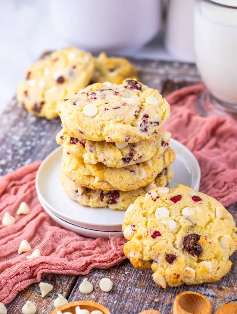 a stack of copycat Subway raspberry cheesecake cookies on a small white dessert plate