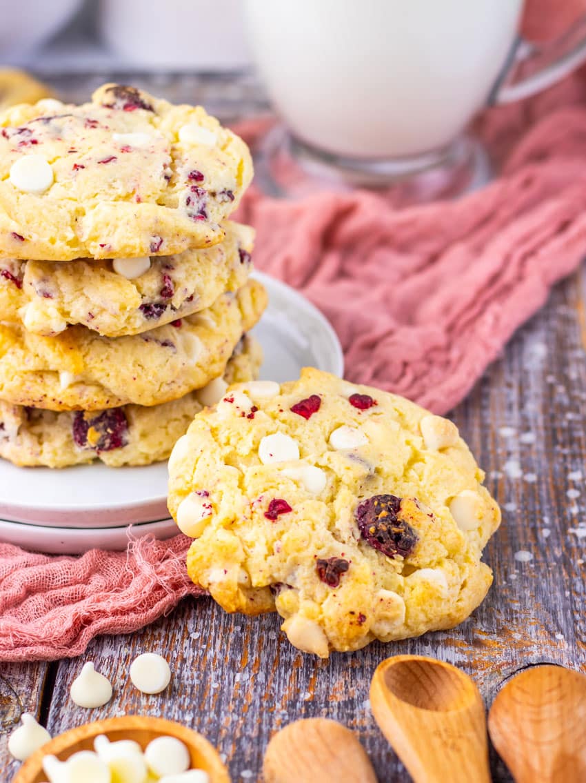 a stack of copycat Subway raspberry cheesecake cookies on a small white dessert plate