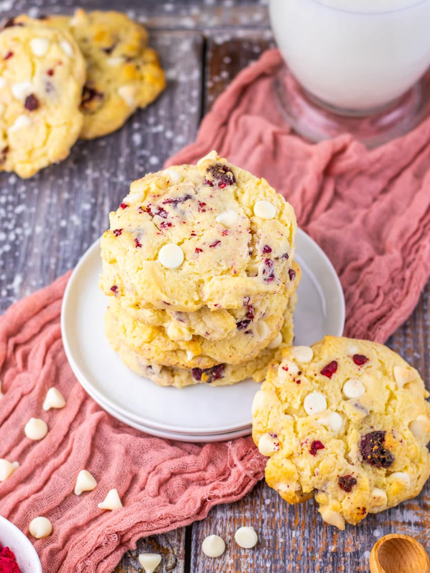 a stack of copycat Subway raspberry cheesecake cookies on a small white dessert plate