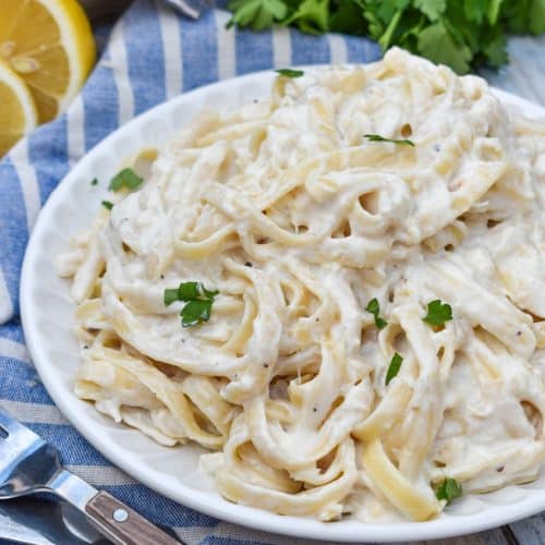 easy crab pasta on a small white plate