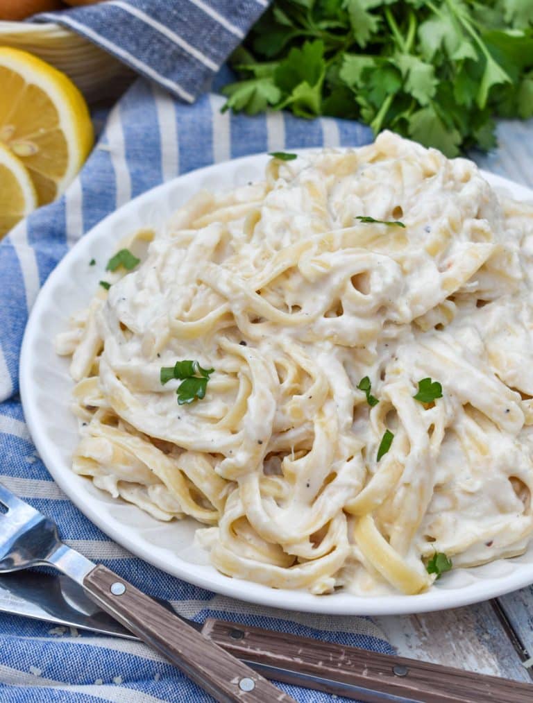 easy crab pasta on a small white plate