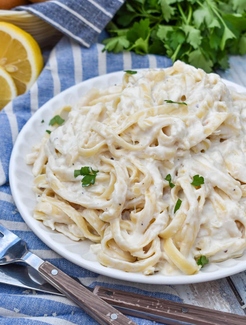easy crab pasta on a small white plate