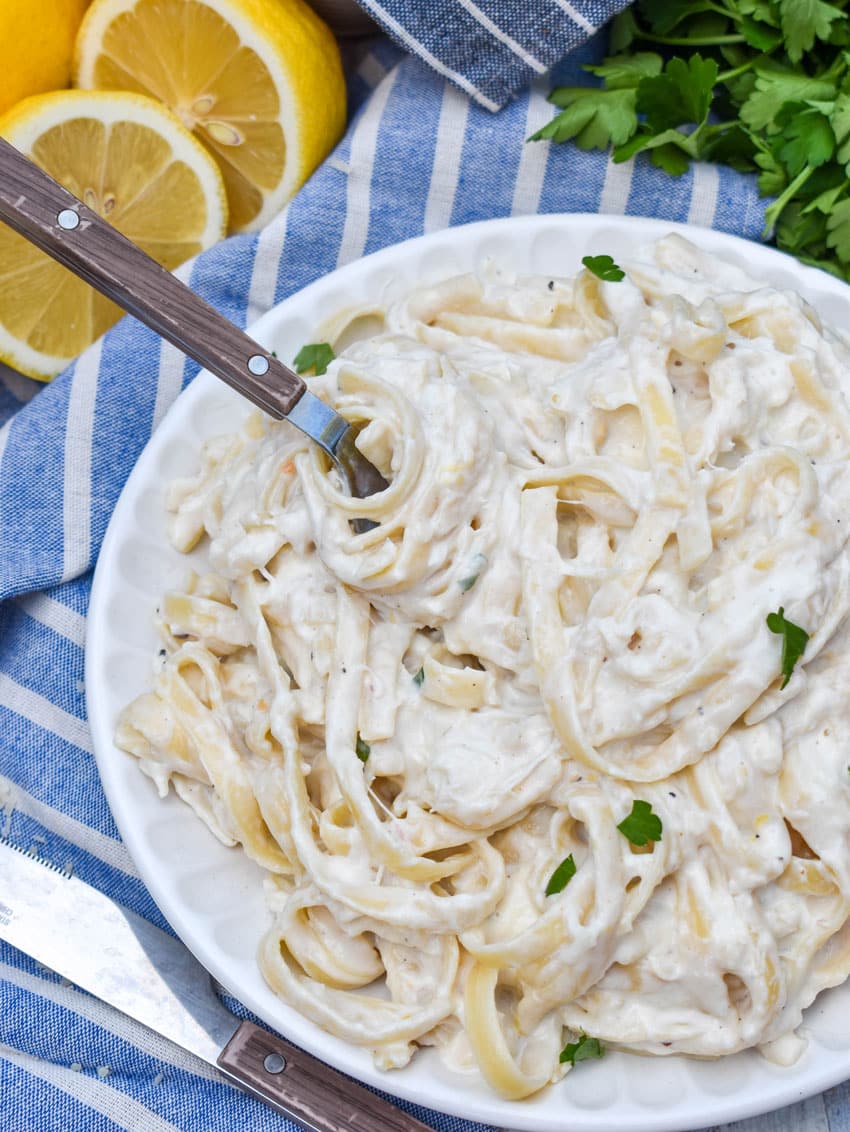 easy crab pasta on a small white plate