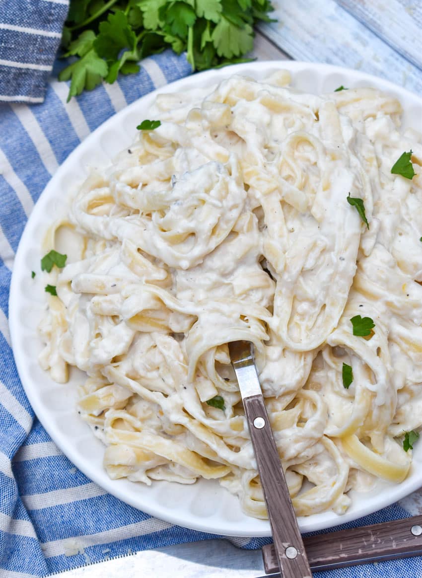 easy crab pasta on a small white plate