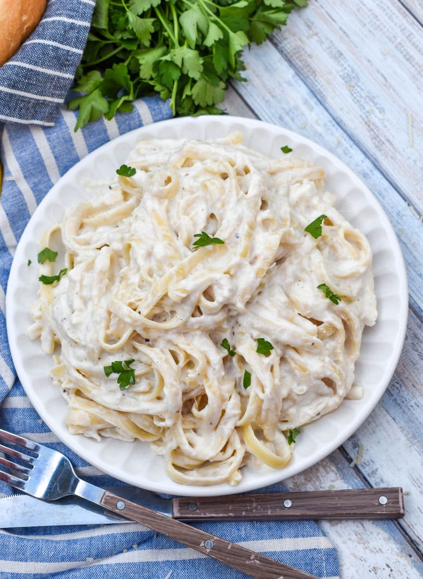 easy crab pasta on a small white plate