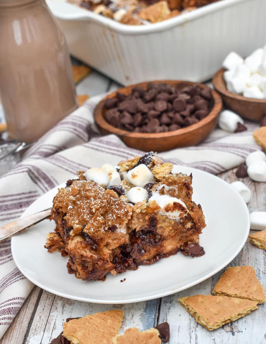 a slice of s'mores french toast bake on a small white plate
