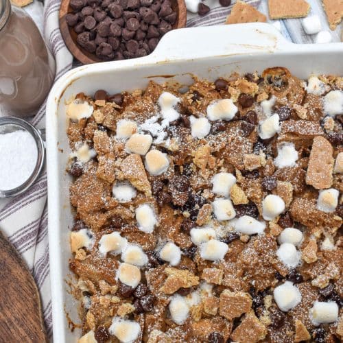 a s'mores french toast bake in a white square baking dish