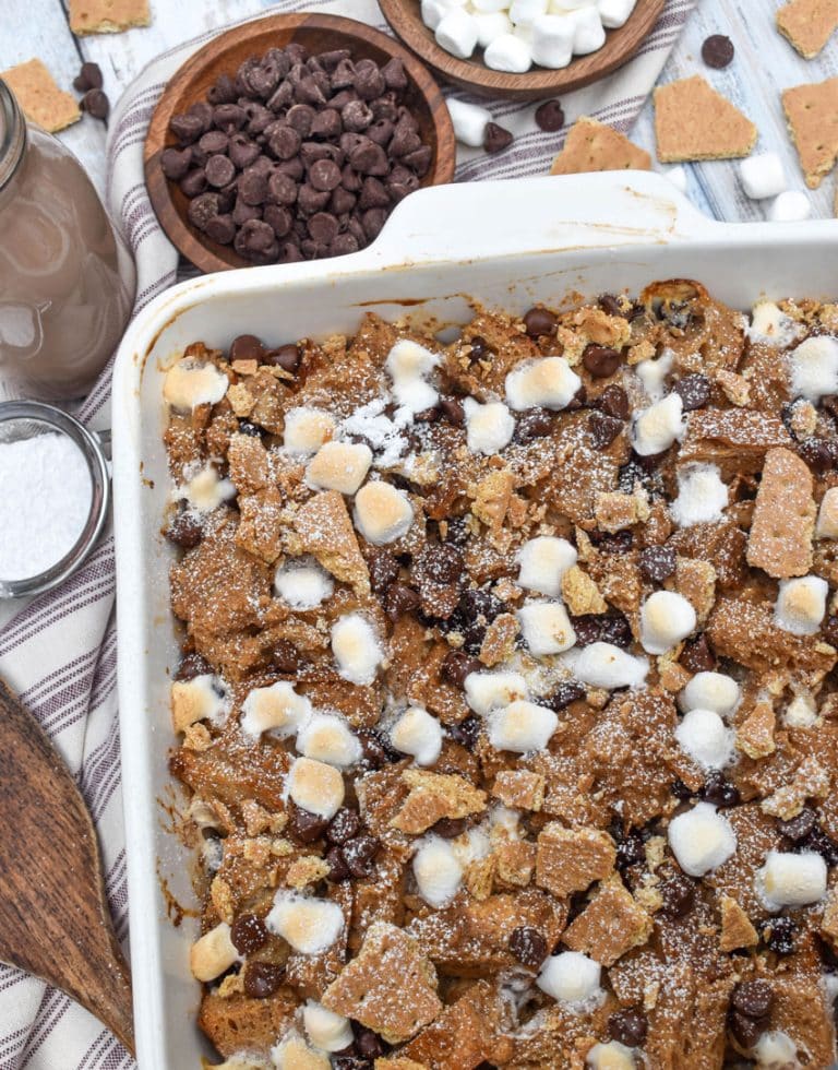 a s'mores french toast bake in a white square baking dish