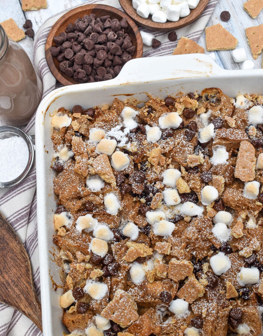 a s'mores french toast bake in a white square baking dish