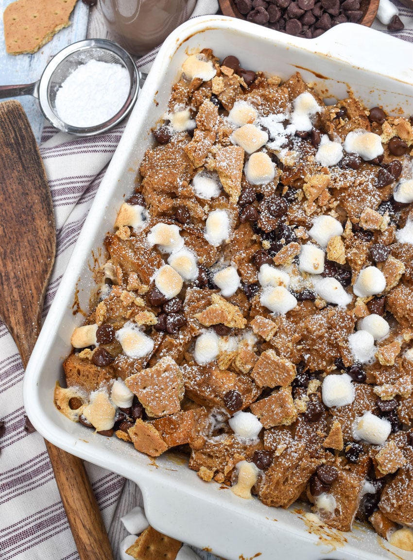 a s'mores french toast bake in a white square baking dish
