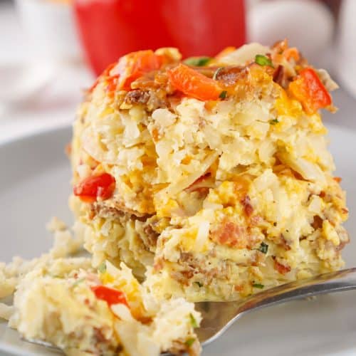 a slice of slow cooker breakfast casserole on a gray plate