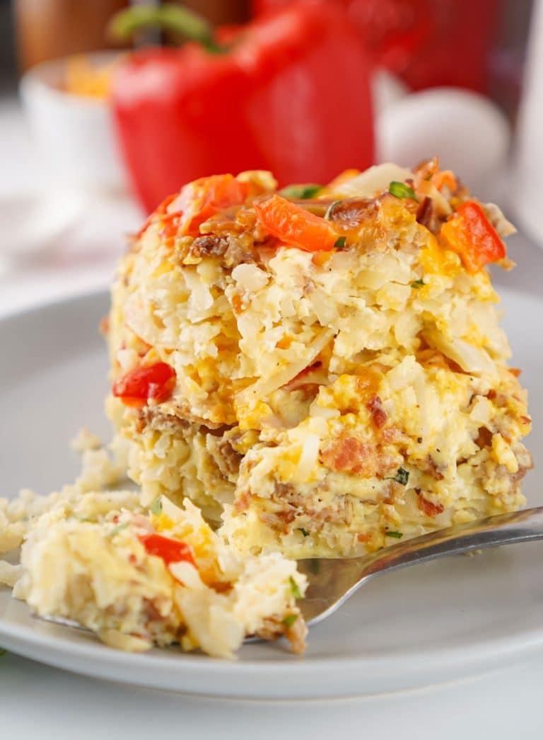 a slice of slow cooker breakfast casserole on a gray plate