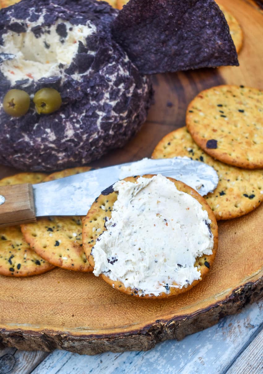 italian flavored cream cheese spread on a multigrain cracker