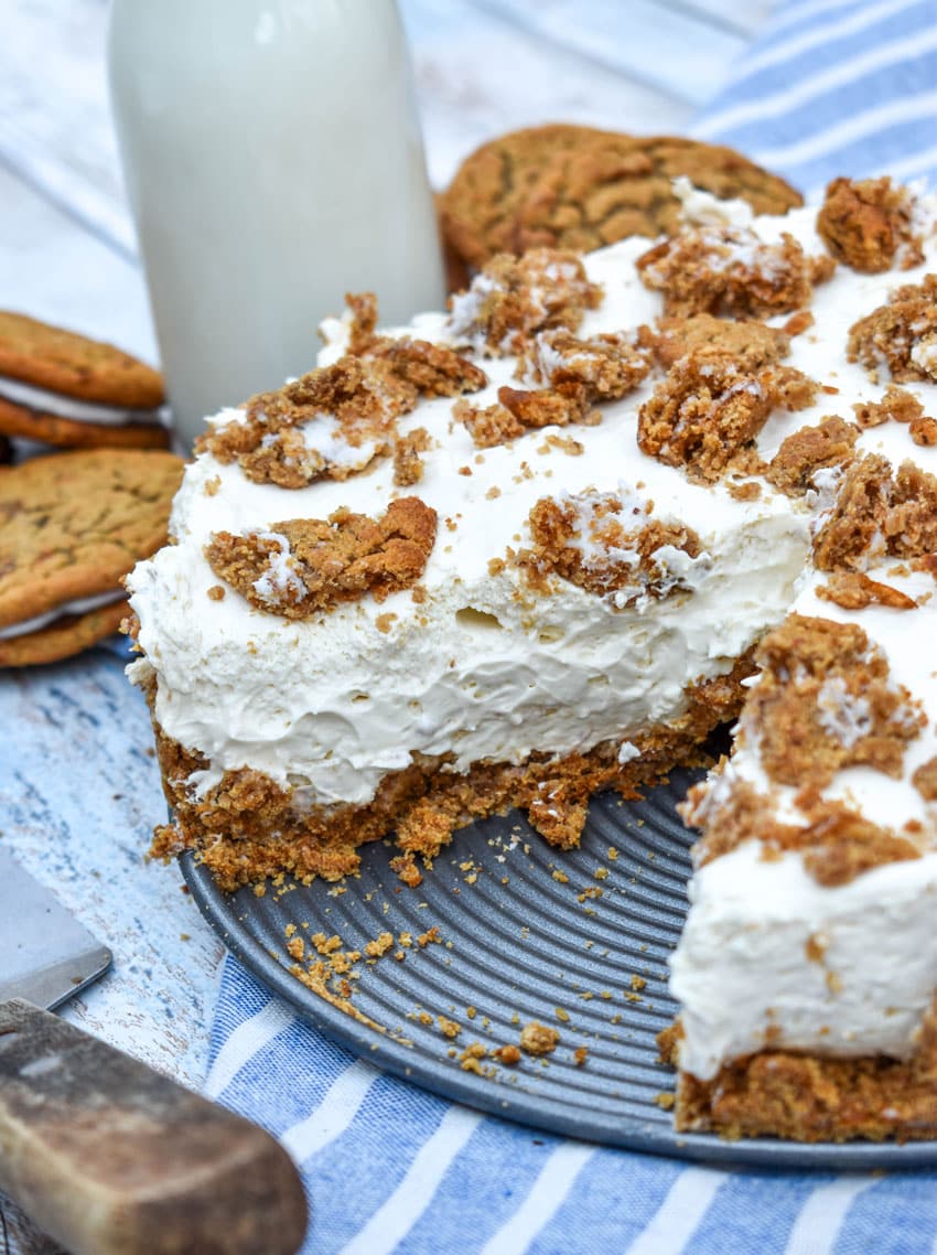 an oatmeal creme pie cheesecake with a slice removed to show the filling