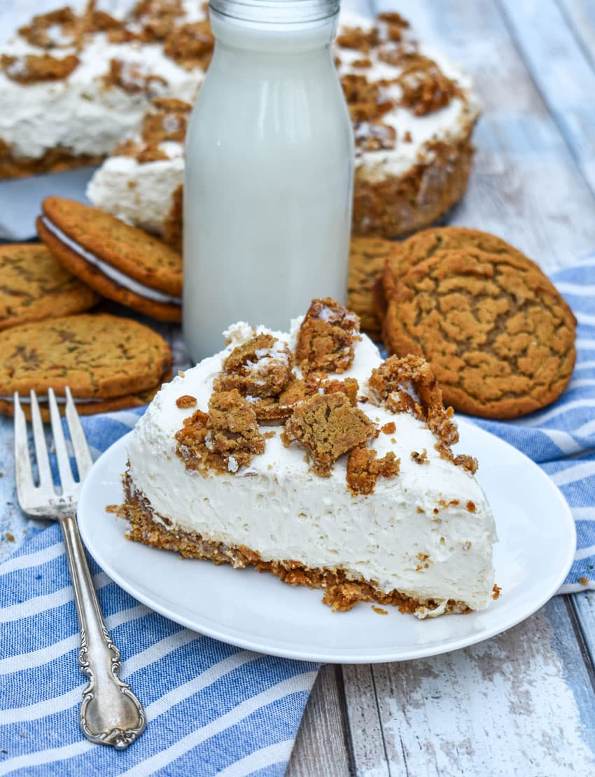 a slice of no bake oatmeal creme pie cheesecake on a small white dessert plate