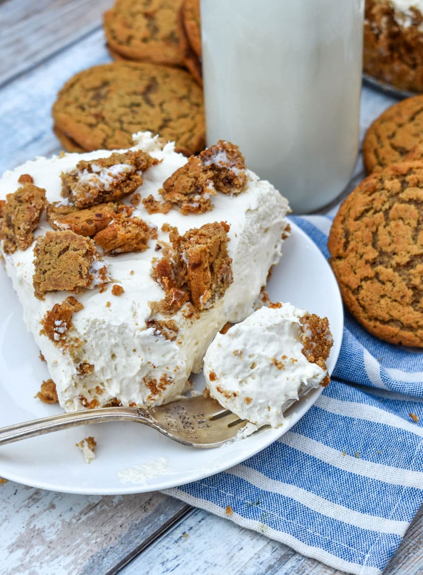 a slice of no bake oatmeal creme pie cheesecake on a small white dessert plate
