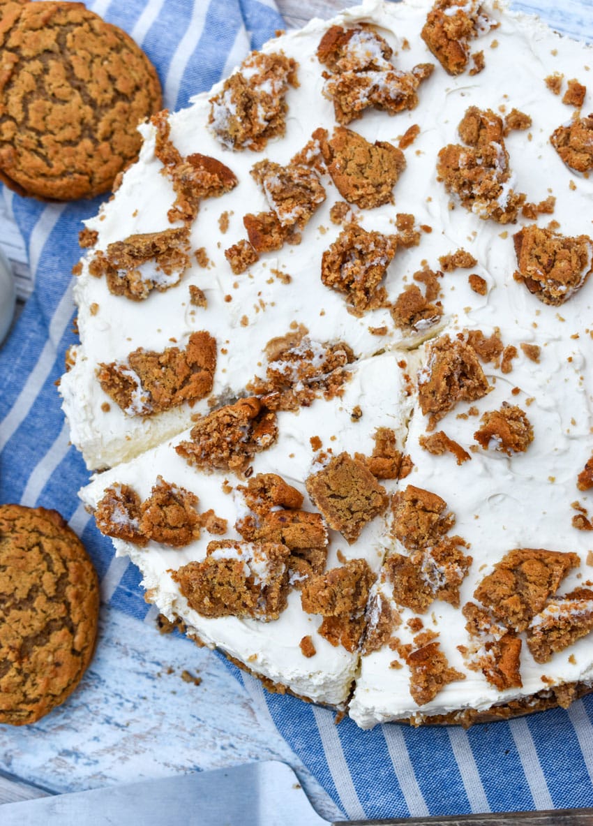 an overhead image showing a no baked oatmeal creme pie cheesecake on a wooden table