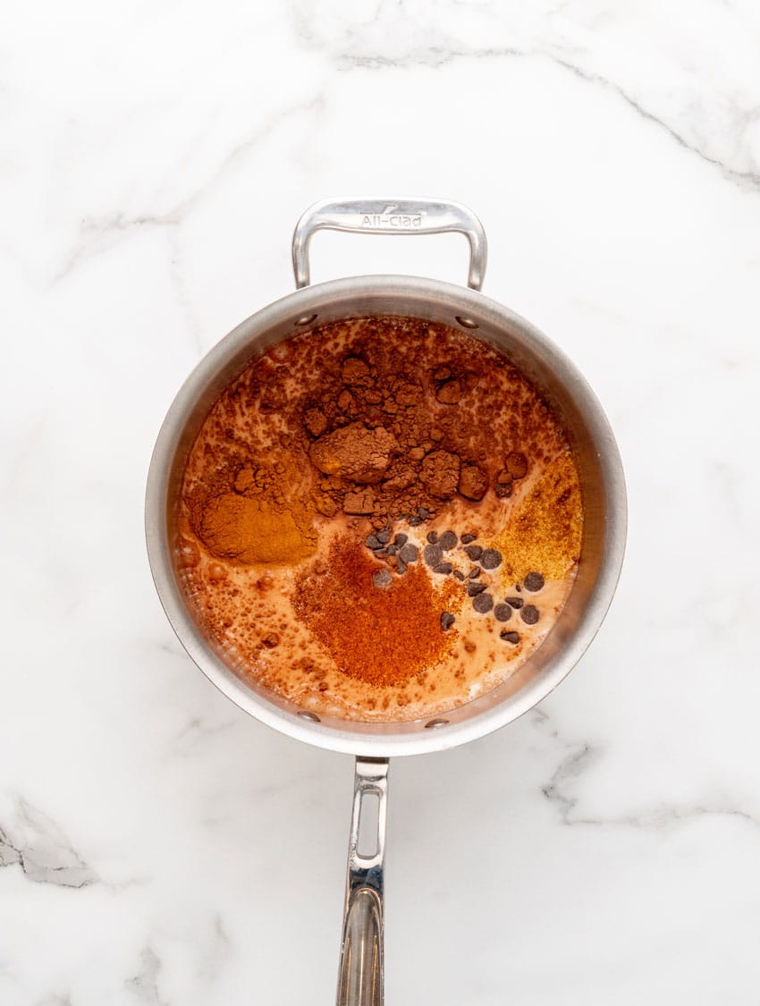 mexican hot chocolate ingredients in a small sauce pan