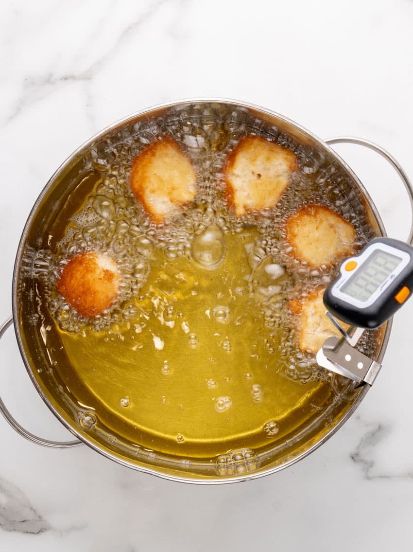 homemade denny's pancake puppies frying in hot oil