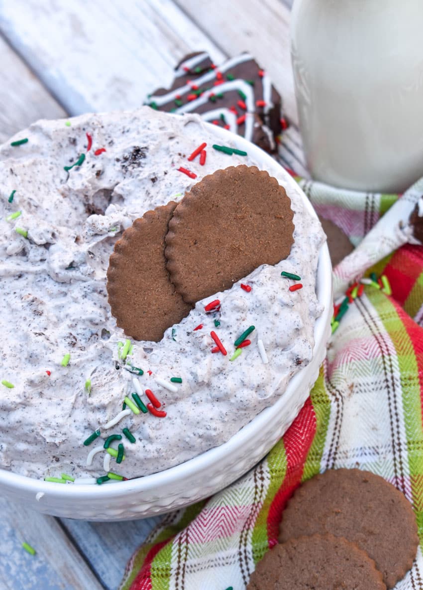 hot cocoa cookies in a bowl of christmas tree cake dip