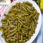 mississippi green beans on a white serving platter