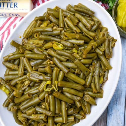 mississippi green beans on a white serving platter