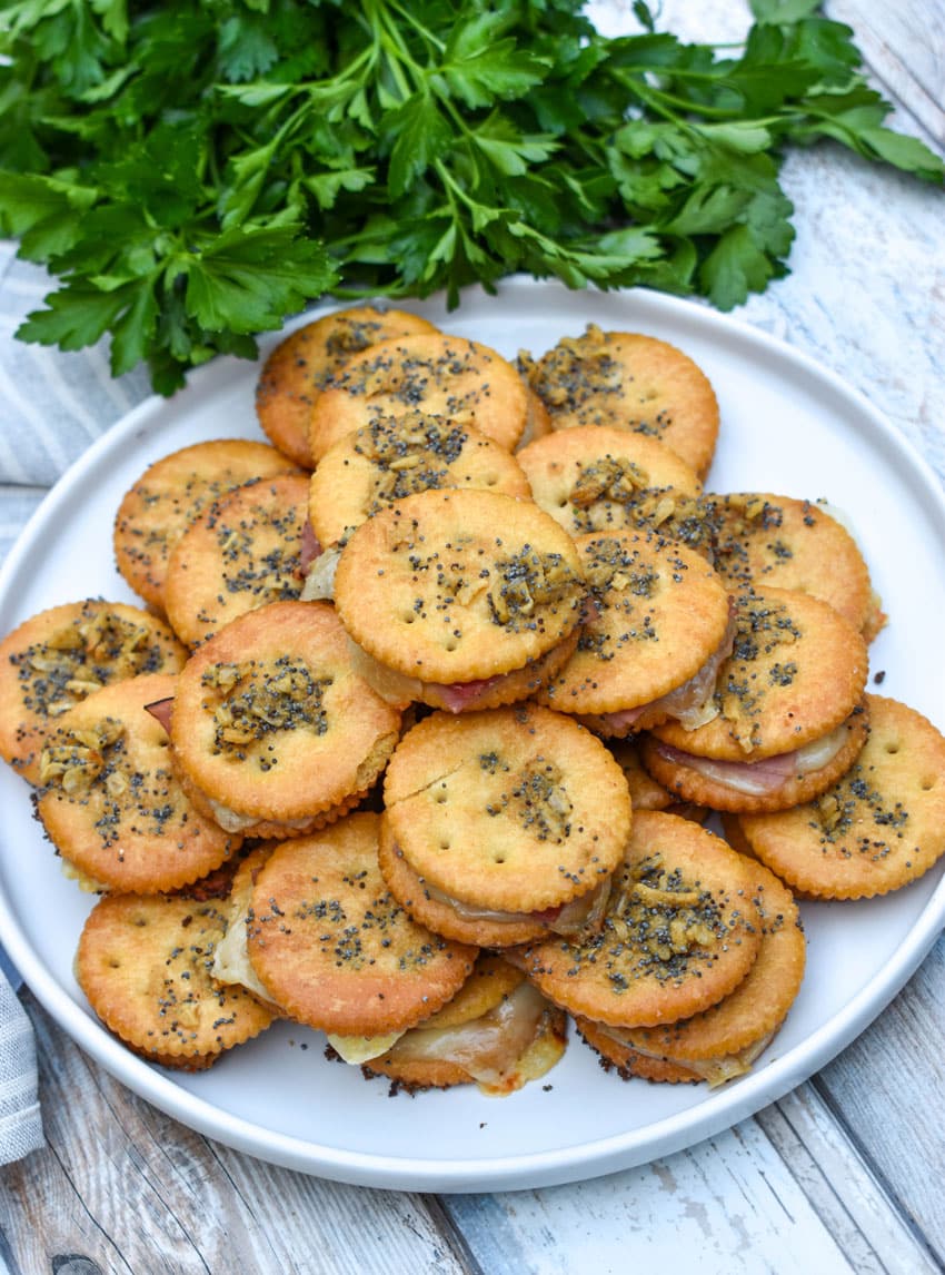 baked ritz cracker party sandwiches on a rimmed baking sheet