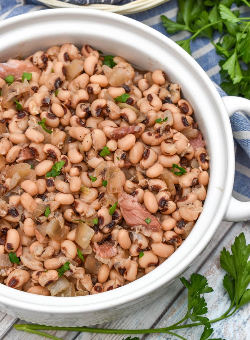 slow cooker black eyed peas in a white serving bowl