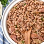 slow cooker black eyed peas in a white serving bowl