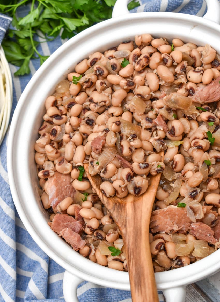 slow cooker black eyed peas in a white serving bowl