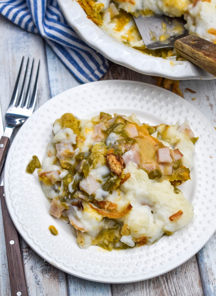 a scoop of thanksgiving leftover pot pie on a small white plate